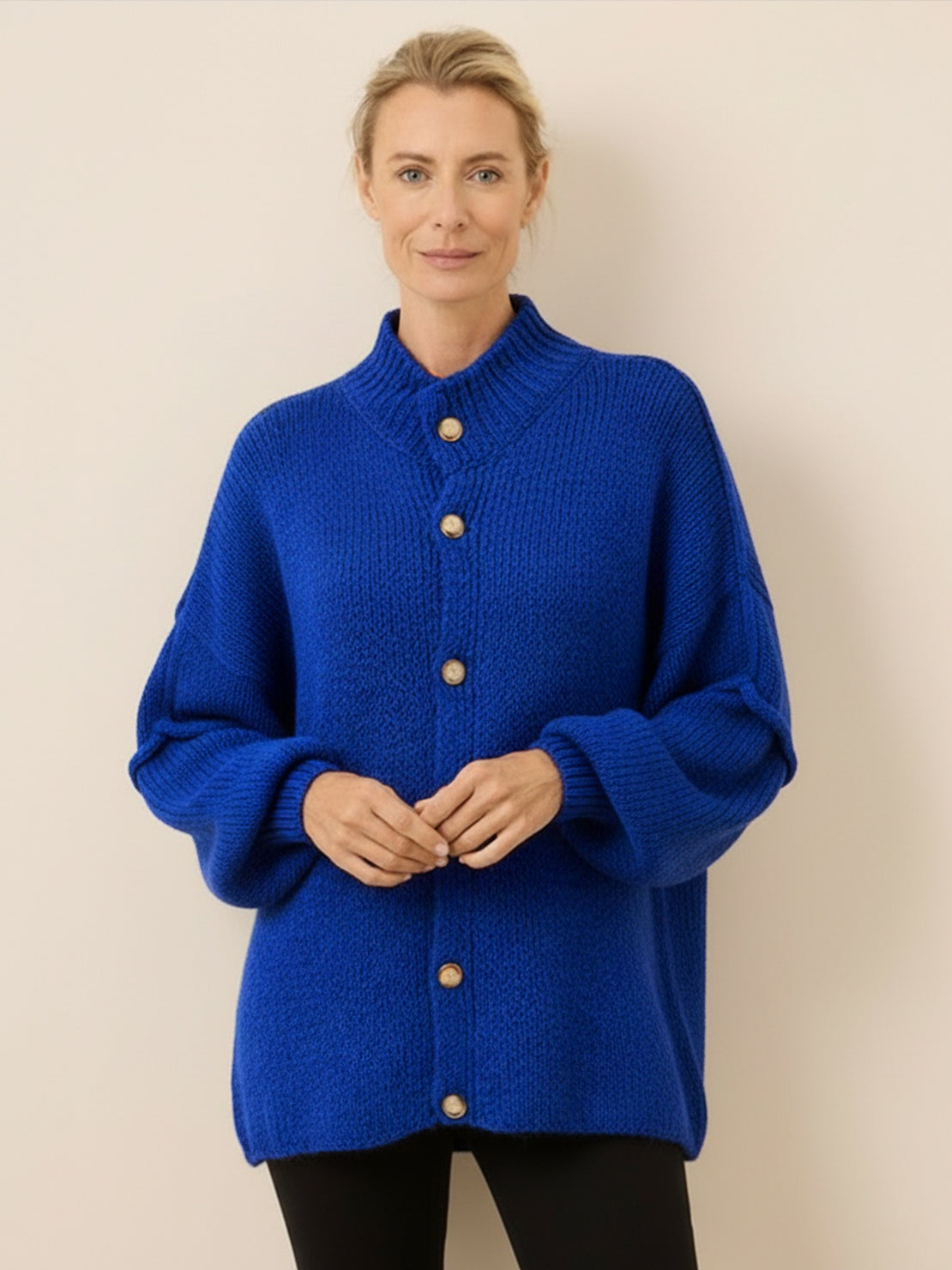 Oversized button-front knit cardigan with balloon sleeves and gold-tone buttons