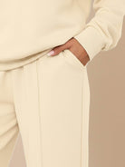 Wrinkle-free polo set two-piece structured breathable casual outfit with high-waisted pants and quarter-button top