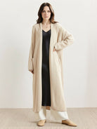 Long Australian Merino Wool cardigan with open front and front patch pockets, perfect for layering in fall and winter
