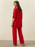 Oversized long-line loungewear set with pullover and wide-leg pants in soft knit fabric
