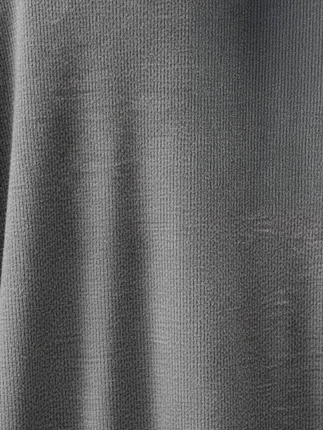 Oversized long-line loungewear set with short-sleeve pullover and wide-leg pants in soft knit fabric