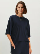 Oversized long-line loungewear set with pullover and wide-leg pants in soft knit fabric