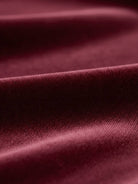 Ultra-soft velvet half-zip hoodie with kangaroo pocket and relaxed fit