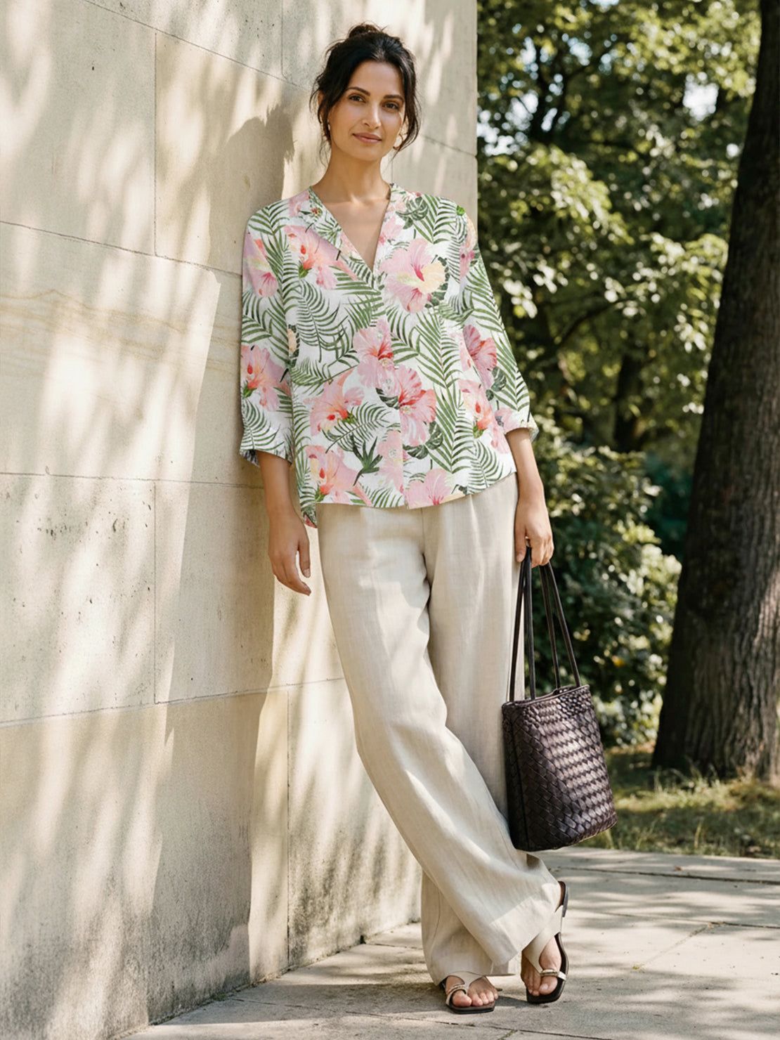 floral button-down shirt with long roll-up sleeves and relaxed hip-length fit