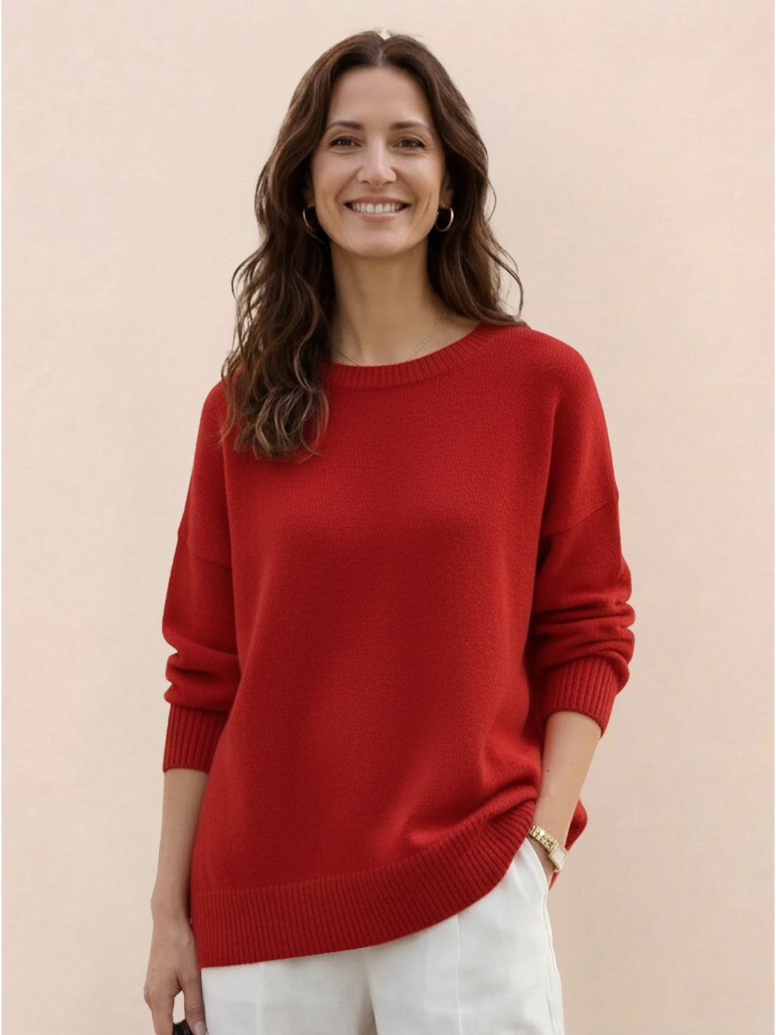 Oversized crew neck knit sweater with drop-shoulder sleeves and ribbed cuffs in neutral color