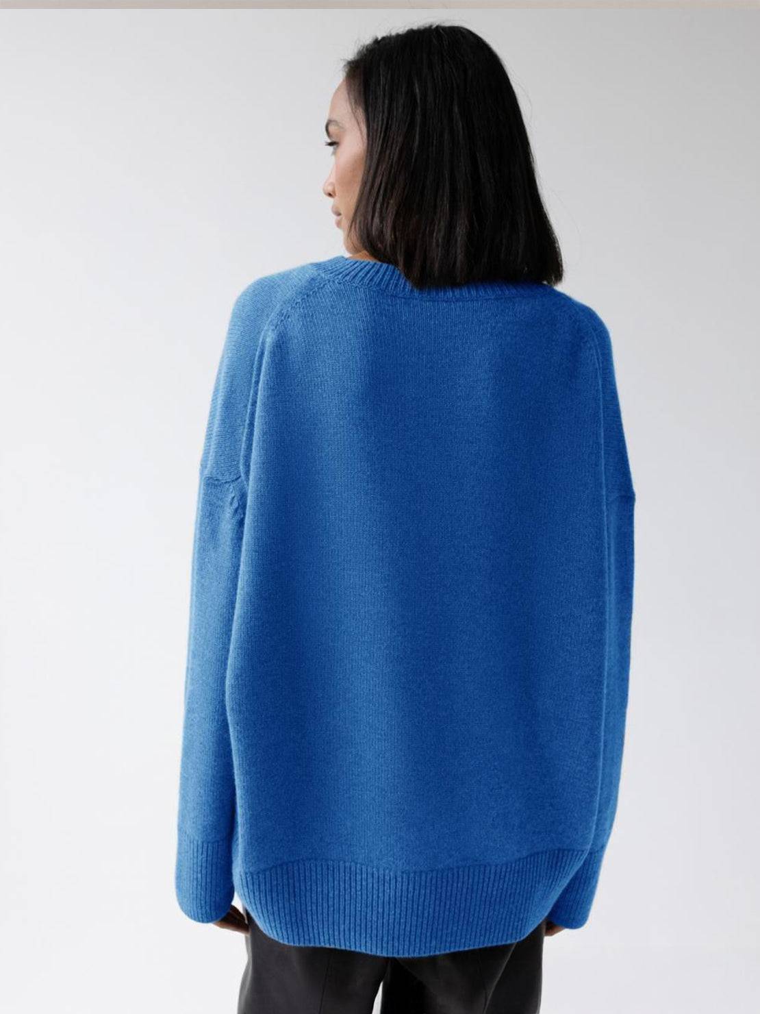 Oversized crew neck knit sweater with drop-shoulder sleeves and ribbed cuffs and hem
