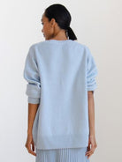 oversized crew neck knit sweater with drop-shoulder sleeves and ribbed cuffs