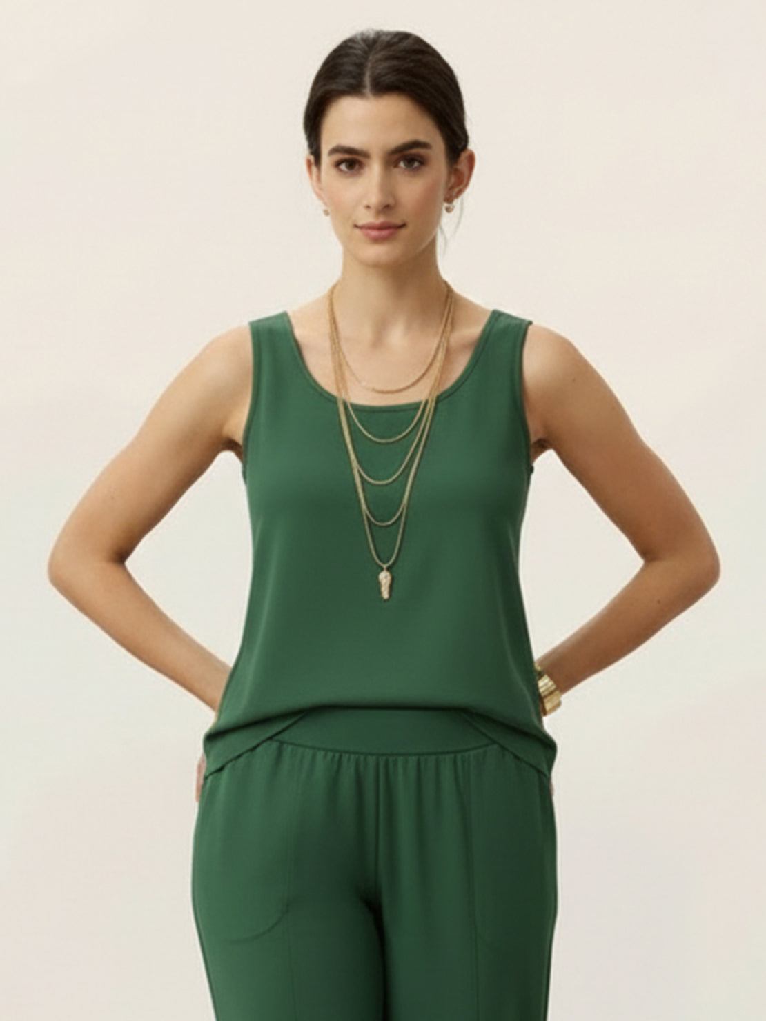 Woman wearing open-front three-piece co-ord with longline cardigan, round-neck tank, and wide-leg trousers