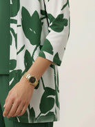 Open-front three-piece co-ord with longline cardigan, tank top, and wide-leg trousers in lightweight knit fabric