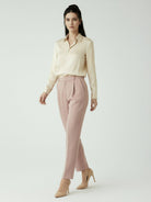 silk-finish button front shirt with smooth fabric, relaxed fit, and curved hem