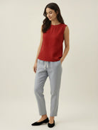 White cotton-linen sleeveless top with button back and relaxed A-line fit