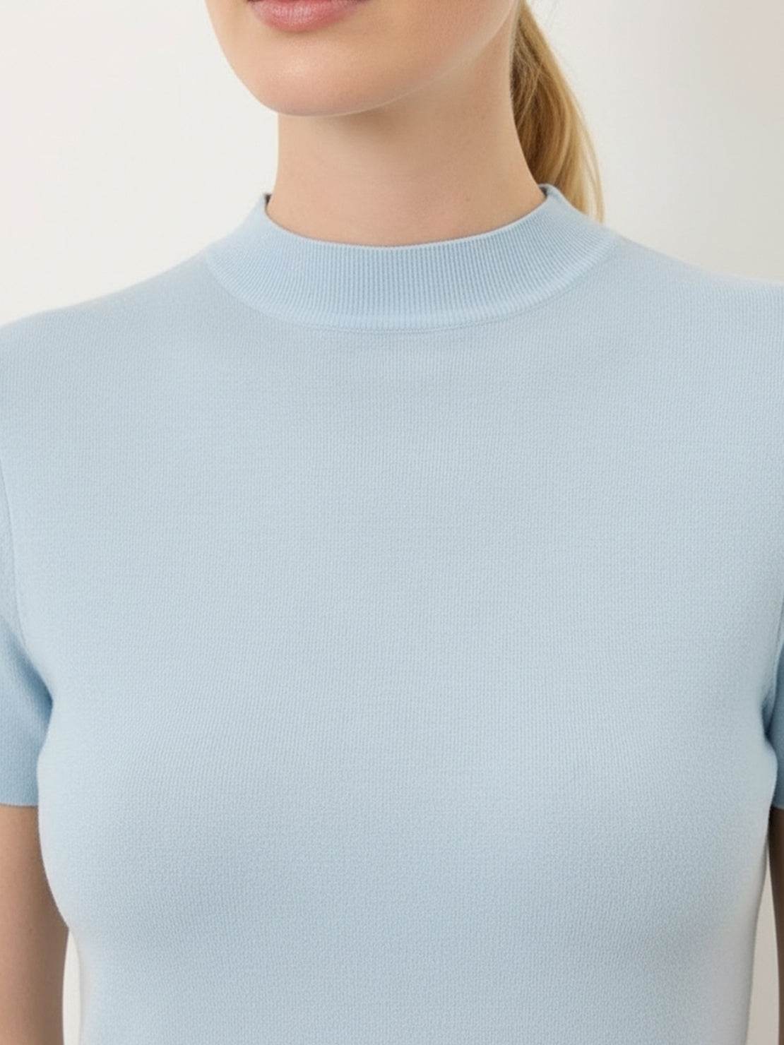 100% Merino Wool short-sleeve mock neck tee with slim fit and breathable fabric