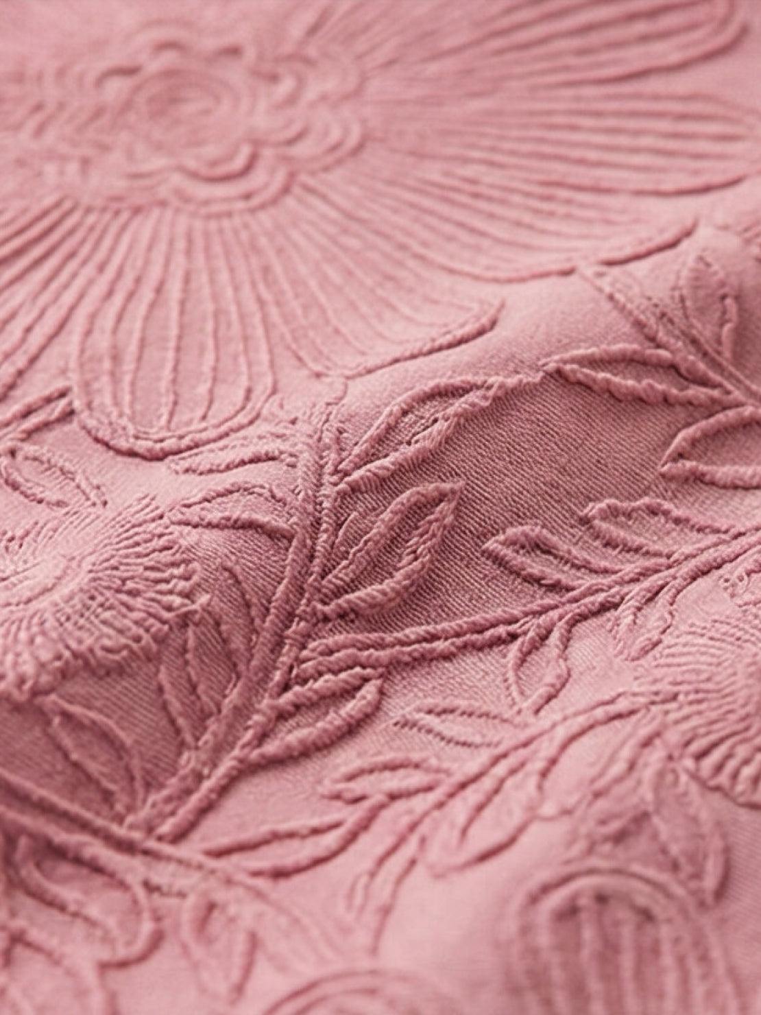 Floral Jacquard Pleated Top with A-line silhouette, 3D floral texture, and flutter sleeves