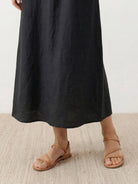 Lightweight cotton linen sleeveless maxi dress with round neckline and flowing ankle-length silhouette