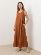 Lightweight cotton linen sleeveless maxi dress with round neckline and flowing ankle-length silhouette