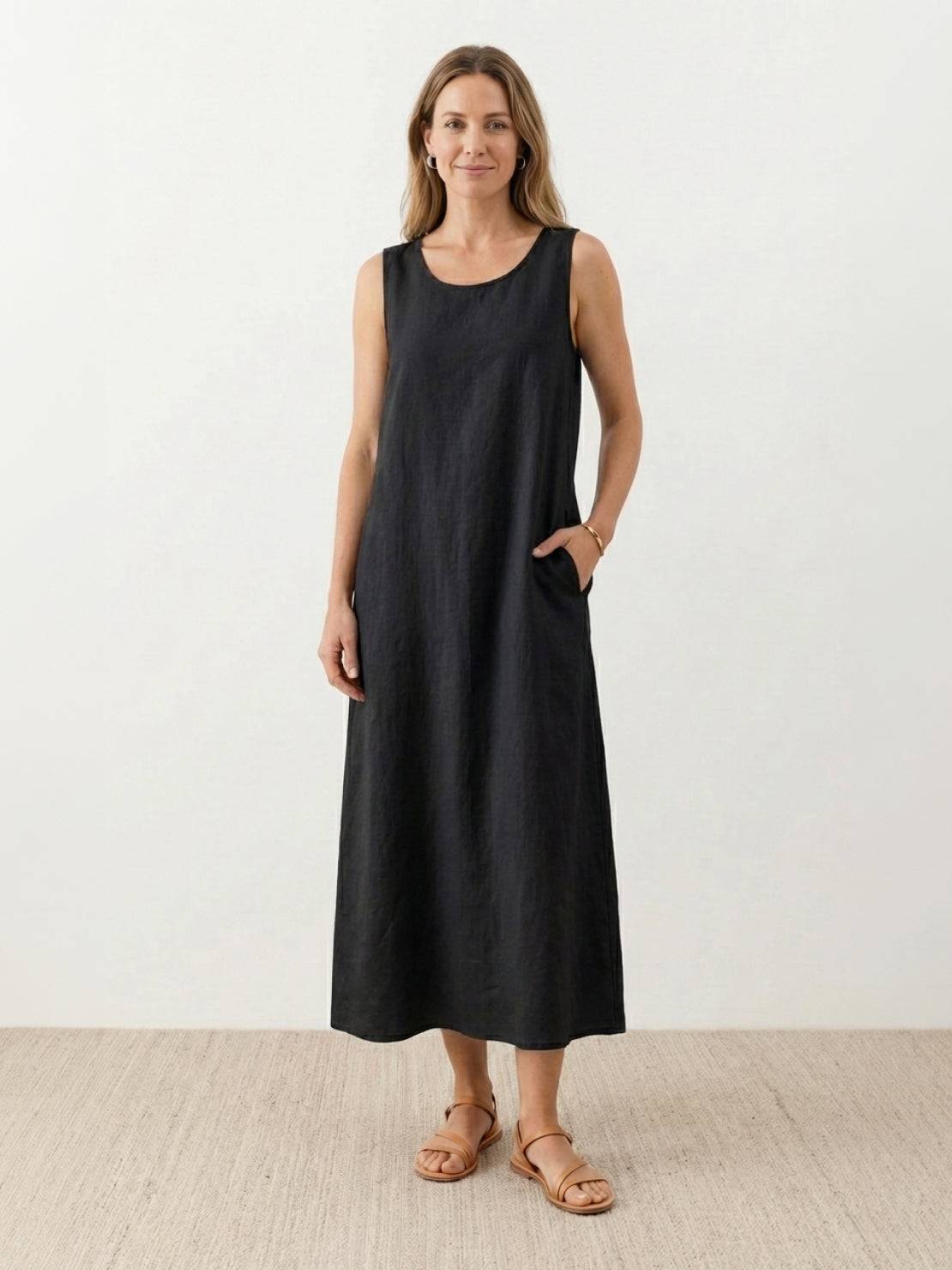 Lightweight cotton linen sleeveless maxi dress with round neckline and flowing ankle-length silhouette