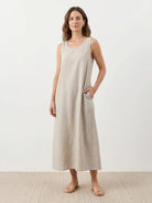 Lightweight cotton linen sleeveless maxi dress with round neckline and loose flowing ankle-length silhouette