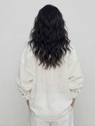 100% cotton-linen oversized classic shirt with dropped shoulders and curved hem