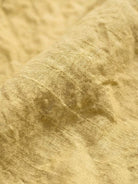 100% linen harem balloon pants with elastic drawstring waistband and side pockets in natural crinkle texture