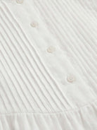 Sleeveless cotton linen pleated midi dress with round neckline and empire waist