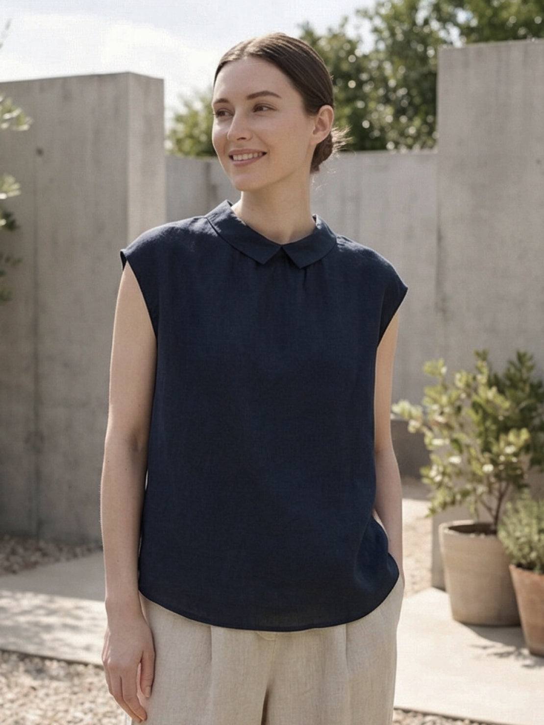 100% linen two-way button blouse with Peter Pan collar and cap sleeves in relaxed A-line fit