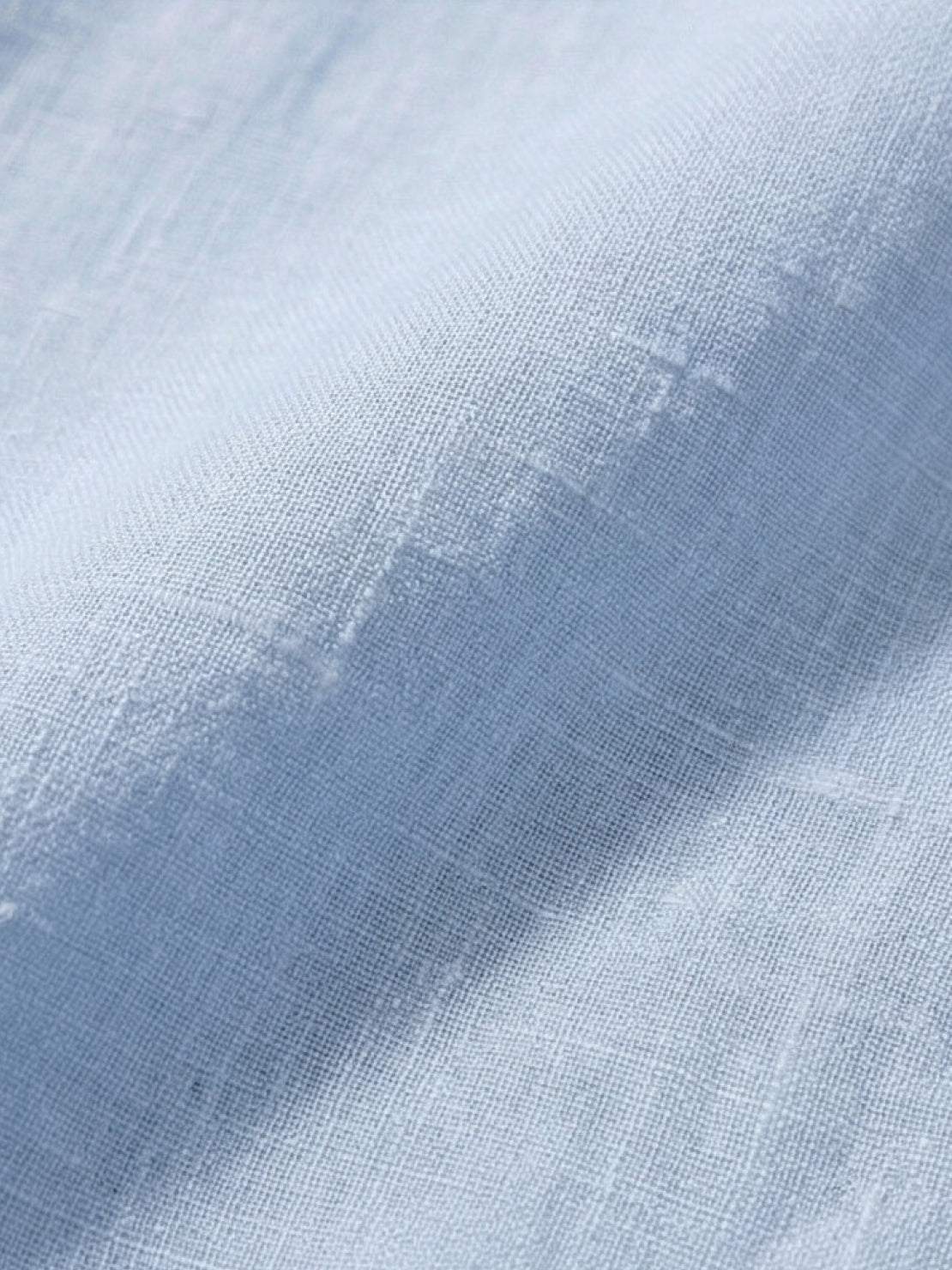 Loose oversized 100% linen dropped-shoulder shirt with side slits and rollable cuffs