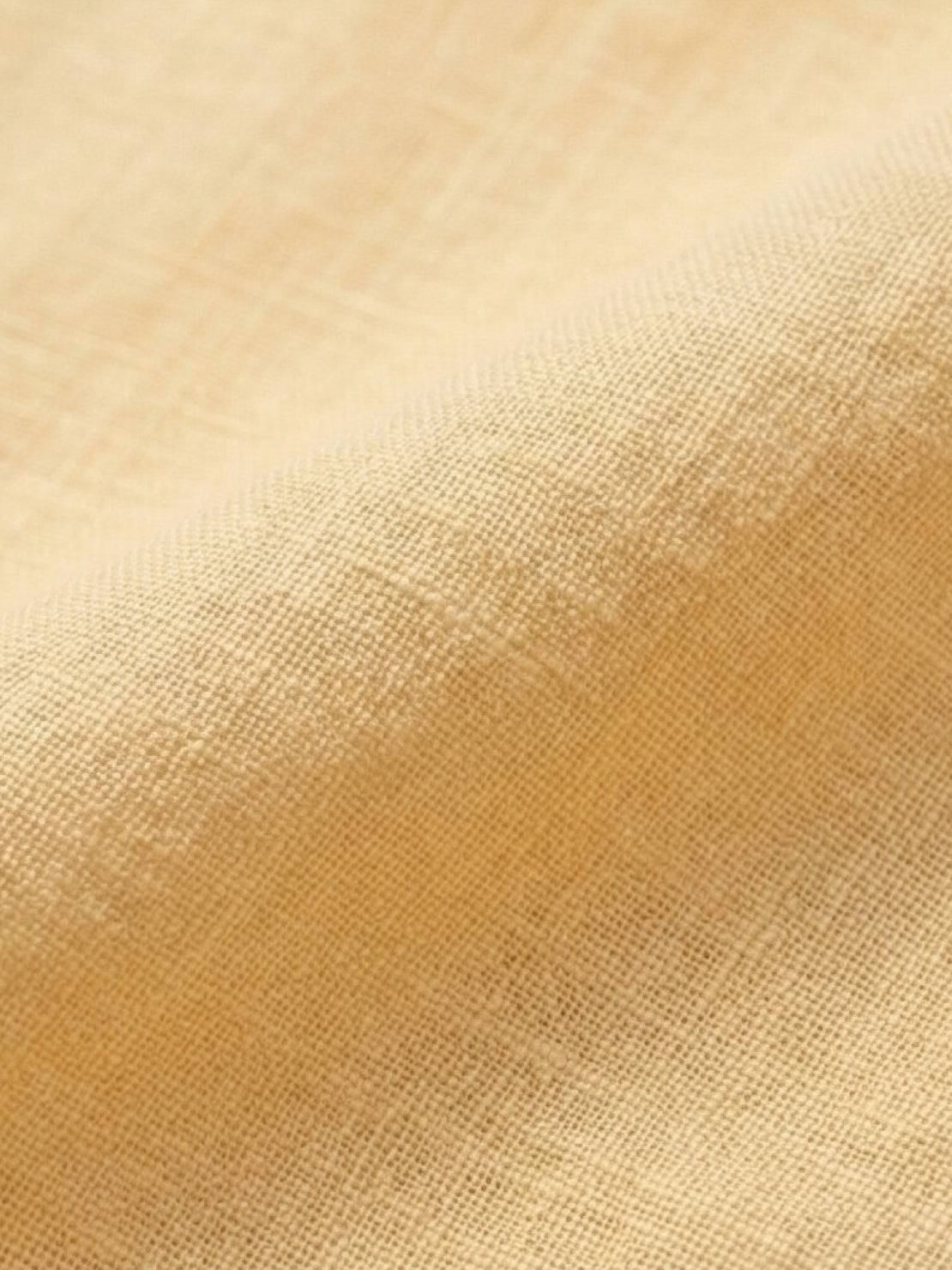 100% linen oversized dropped-shoulder shirt with long rollable sleeves and side slits