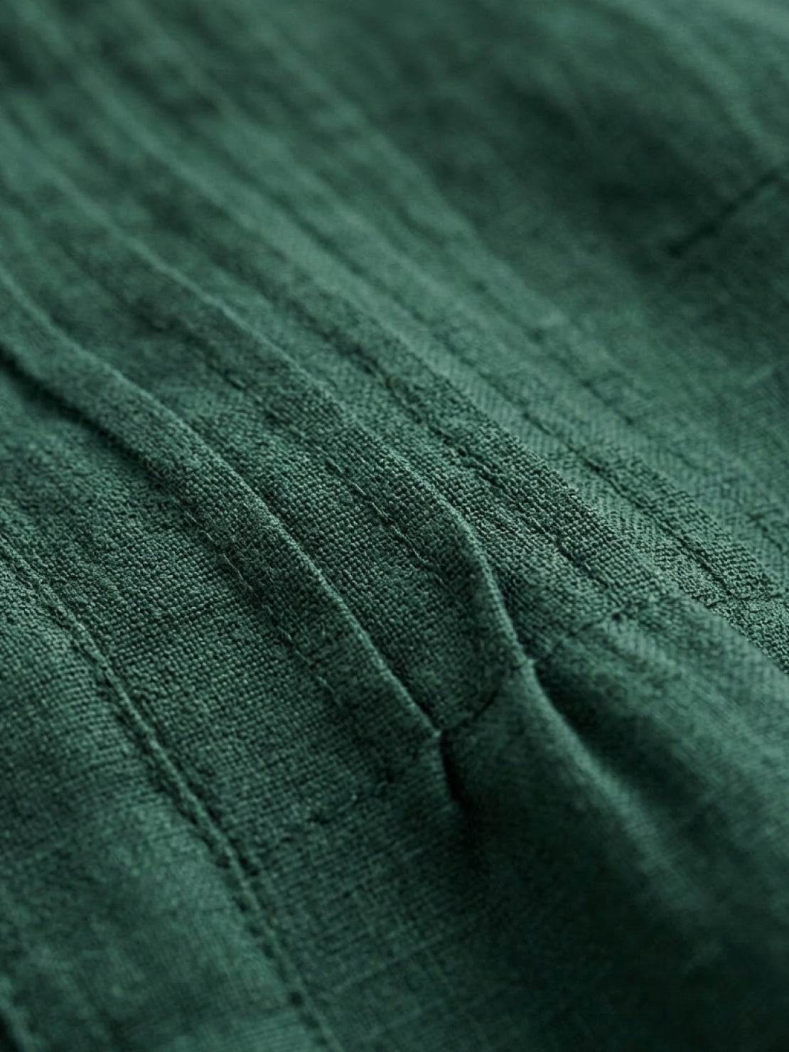 Relaxed cotton linen dress with pintuck pleats, 3/4 sleeves, side slits, and breathable fabric for all-day comfort