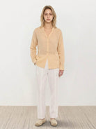 100% linen relaxed fit V-neck shirt with long sleeves and button cuffs