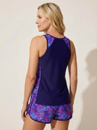 Racerback two-piece tankini set with relaxed-fit racerback tank top and tropical print swim shorts with drawstring waistband and pockets