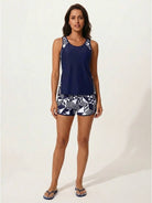 Racerback two-piece tankini set with tropical print swim shorts and built-in brief lining