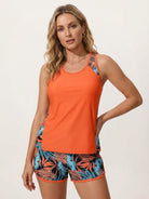 Racerback two-piece tankini set with scoop neckline and tropical print swim shorts with side pockets and drawstring waist