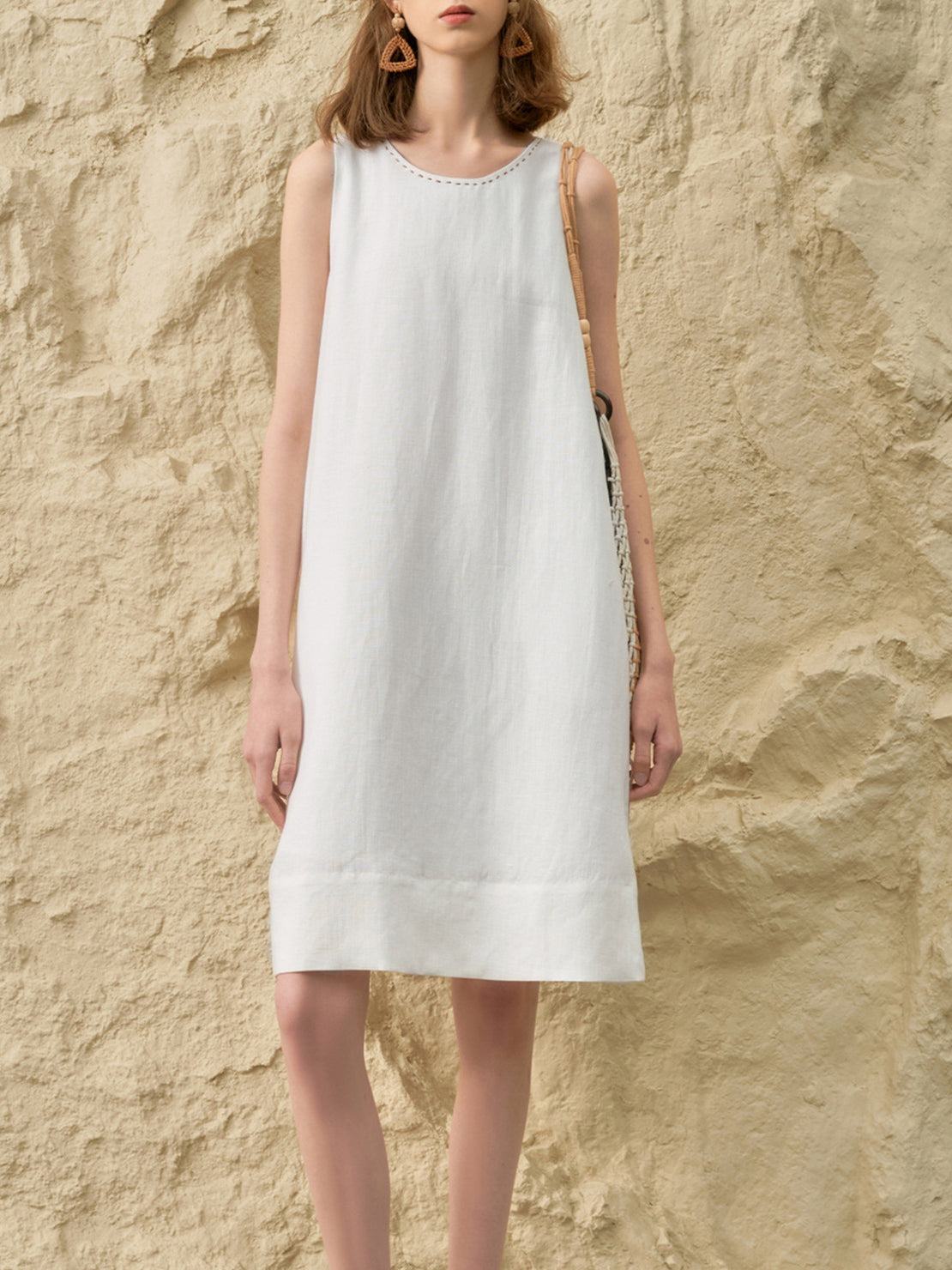 Sleeveless linen lyocell blend shift dress with relaxed A-line silhouette in white and black colors