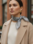 Lightweight 100% linen neck scarf with checkered pattern and natural rolled edges