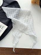 Lightweight 100% linen neck scarf with timeless checkered pattern and natural rolled edges