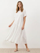 Cotton-linen summer midi dress with tiered skirt and relaxed drop-waist silhouette in lightweight fabric