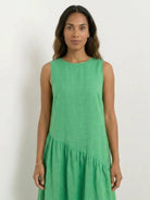 Cotton-linen summer midi dress with tiered skirt and relaxed drop-waist silhouette in lightweight fabric