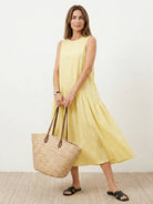 Cotton-linen summer midi dress with tiered skirt and relaxed drop-waist silhouette in lightweight fabric