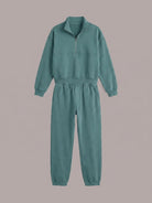 Cotton-blended two-piece tracksuit with high stand collar, zip front, and relaxed-fit pants