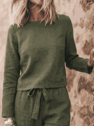 Cotton-linen set with relaxed short-sleeve top and straight-leg pants in monochrome palette