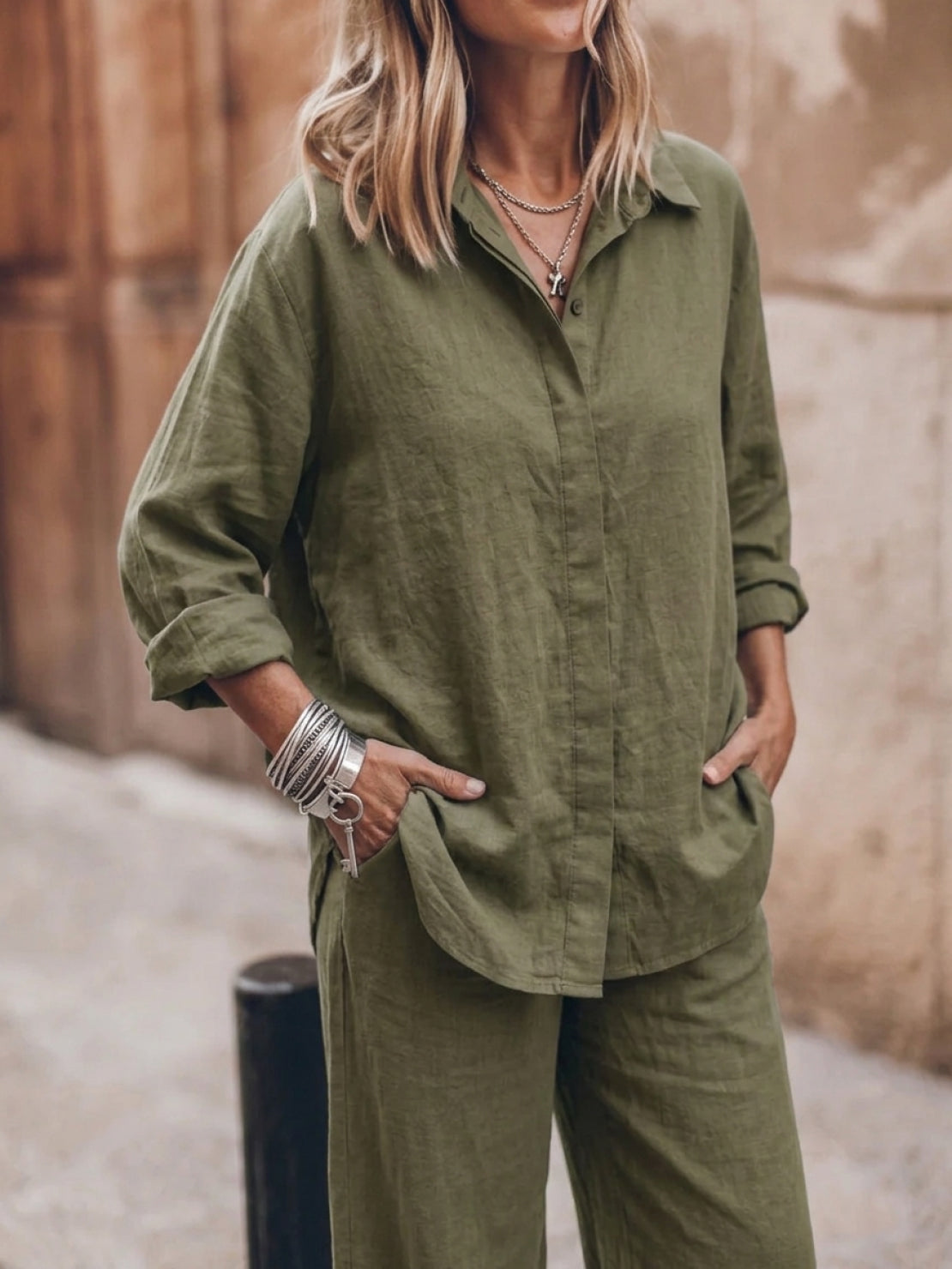 Woman wearing oversized 100% cotton shirt and wide-leg pants co-ord set in relaxed style