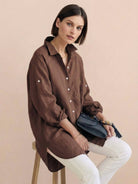 Oversized linen shirt in soft cotton-linen blend with relaxed fit and back button detailing