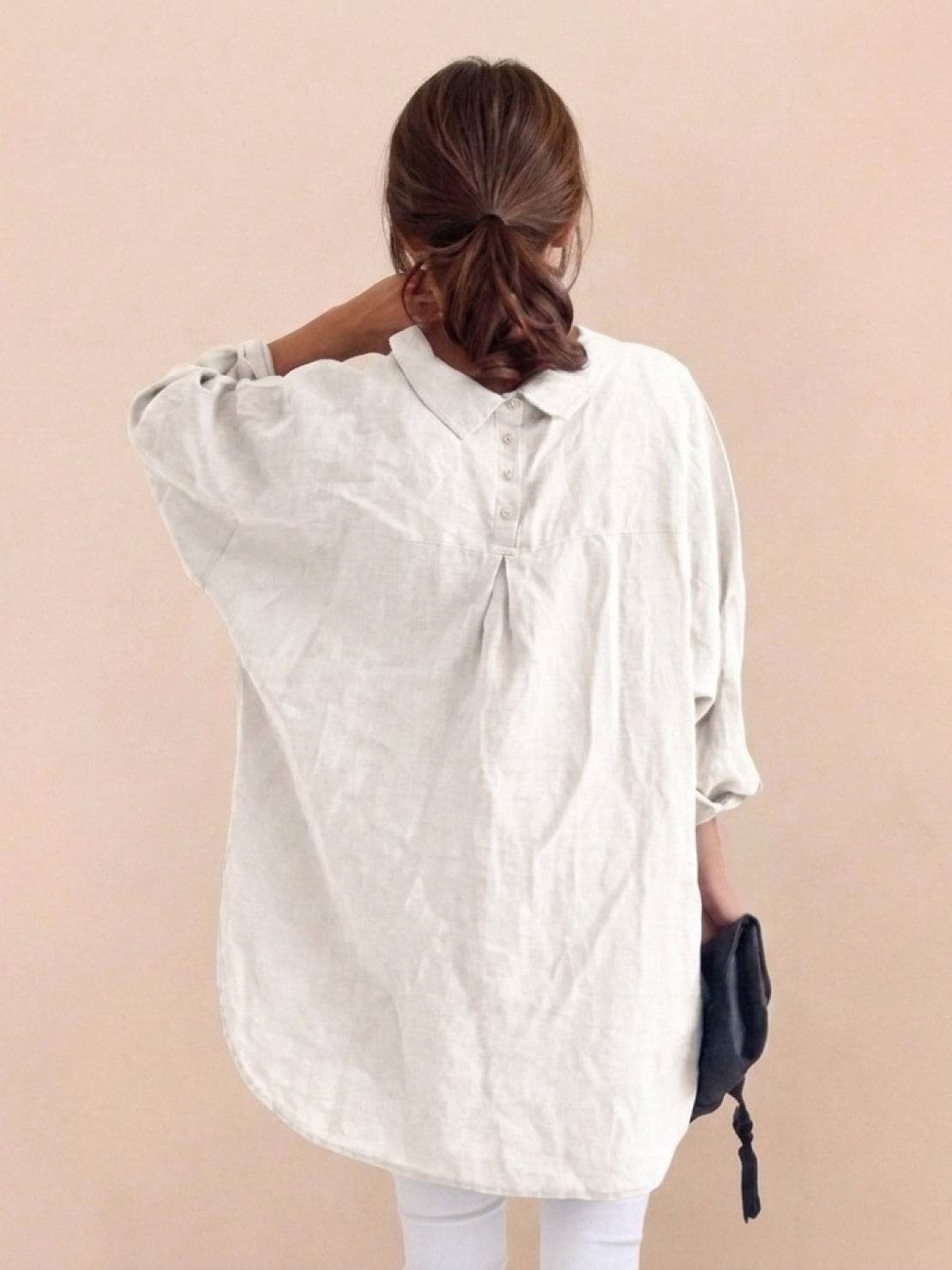 Relaxed oversized 100% cotton linen shirt with boxy fit, dropped shoulders, and signature back pleat detail