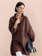 Oversized linen shirt in breathable cotton-linen blend with relaxed silhouette and button back detail