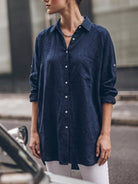 relaxed oversized 100% cotton linen shirt with dropped shoulders and back pleat detail on white background