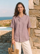 100% linen relaxed V-neck top with asymmetric button detail and short sleeves
