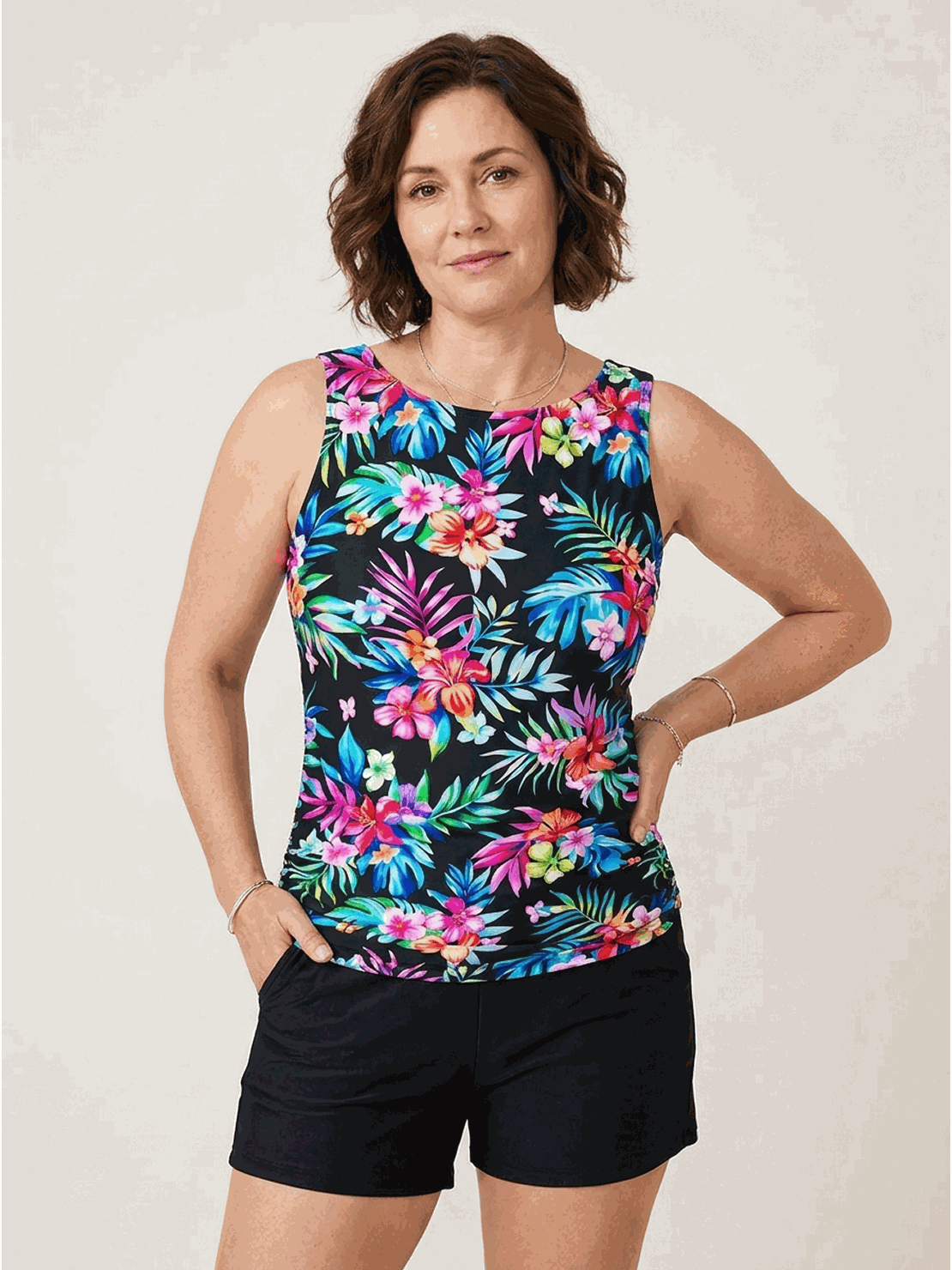 High-neck ruched tankini set with gathered side seams and built-in brief for swimming and beachwear