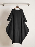 Oversized Bohemian maxi dress in breathable linen blend with long sleeves and loose fit