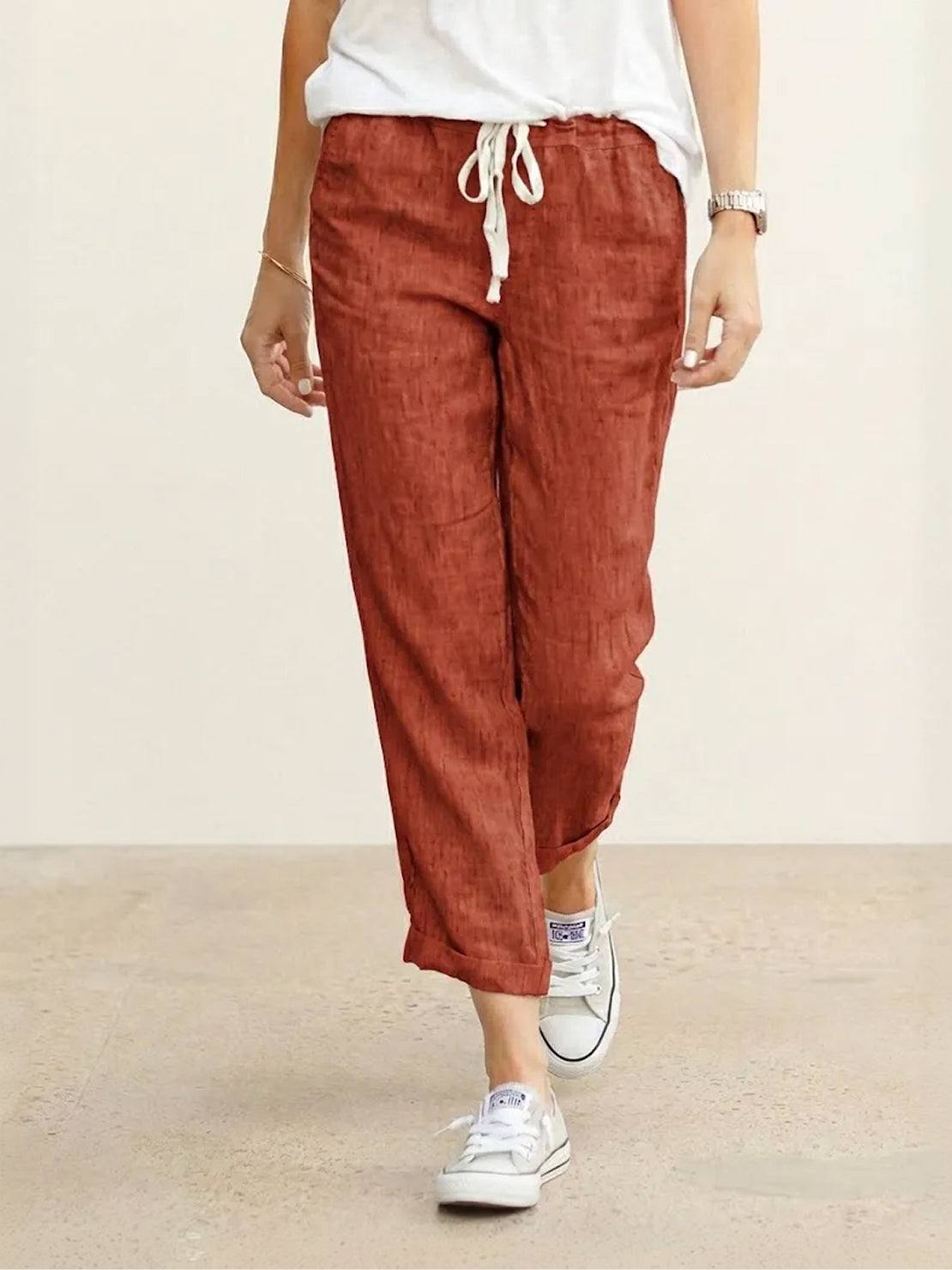 Woman wearing breezy relaxed fit straight pants in casual setting