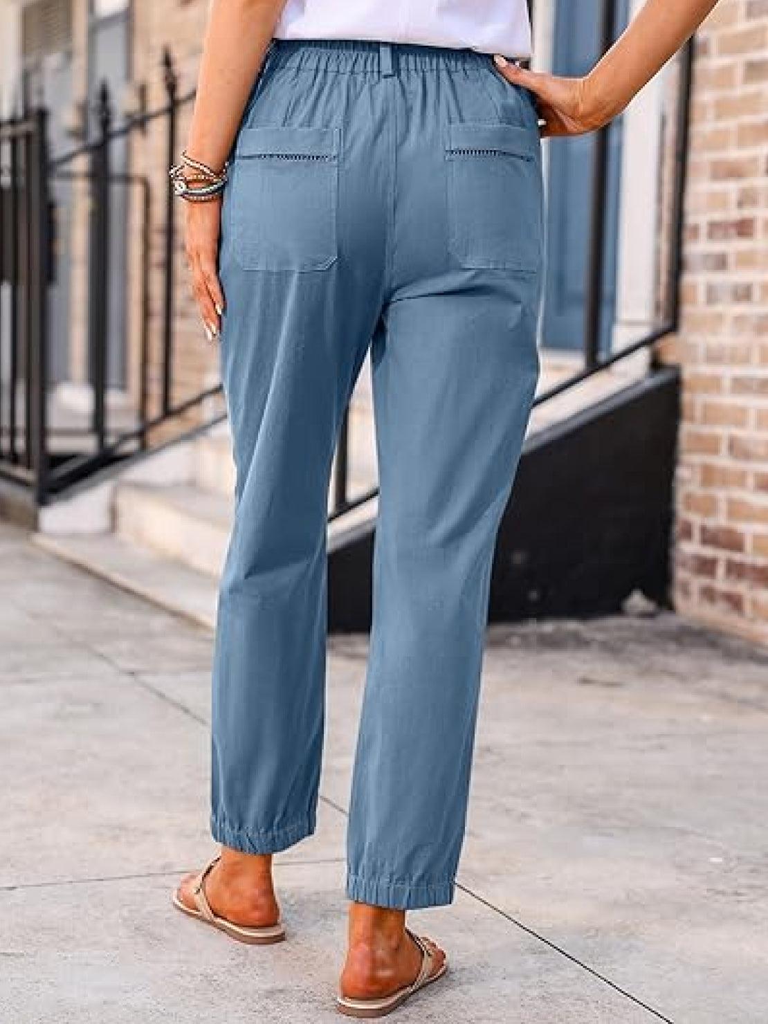 Casual button-down utility-chic trousers featuring deep pockets and soft durable cotton blend fabric